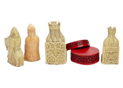 Lot 1068 - Four resin Lewis chessmen.