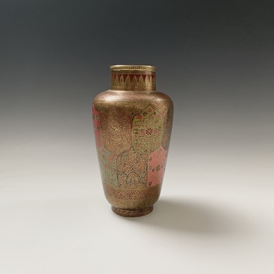 Lot 375 - An Indian brass vase, with polychrome shaped...