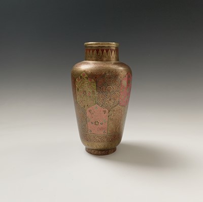 Lot 375 - An Indian brass vase, with polychrome shaped...