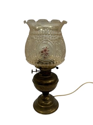 Lot 56 - A brass oil lamp with a Victorian glass shade,...