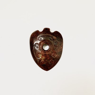 Lot 51 - A Chinese jade heart-shaped pendant, 6.3 x 4.8cm.