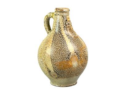 Lot 1019 - A German stoneware Bellarmine jug.