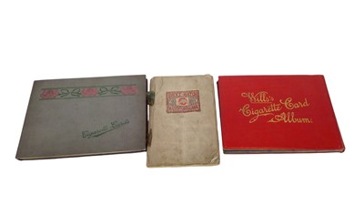 Lot 142 - Two full cigarette card albums and a handmade...