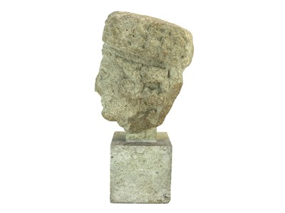 Lot 1115 - A Cypriot limestone head of a female Votary.