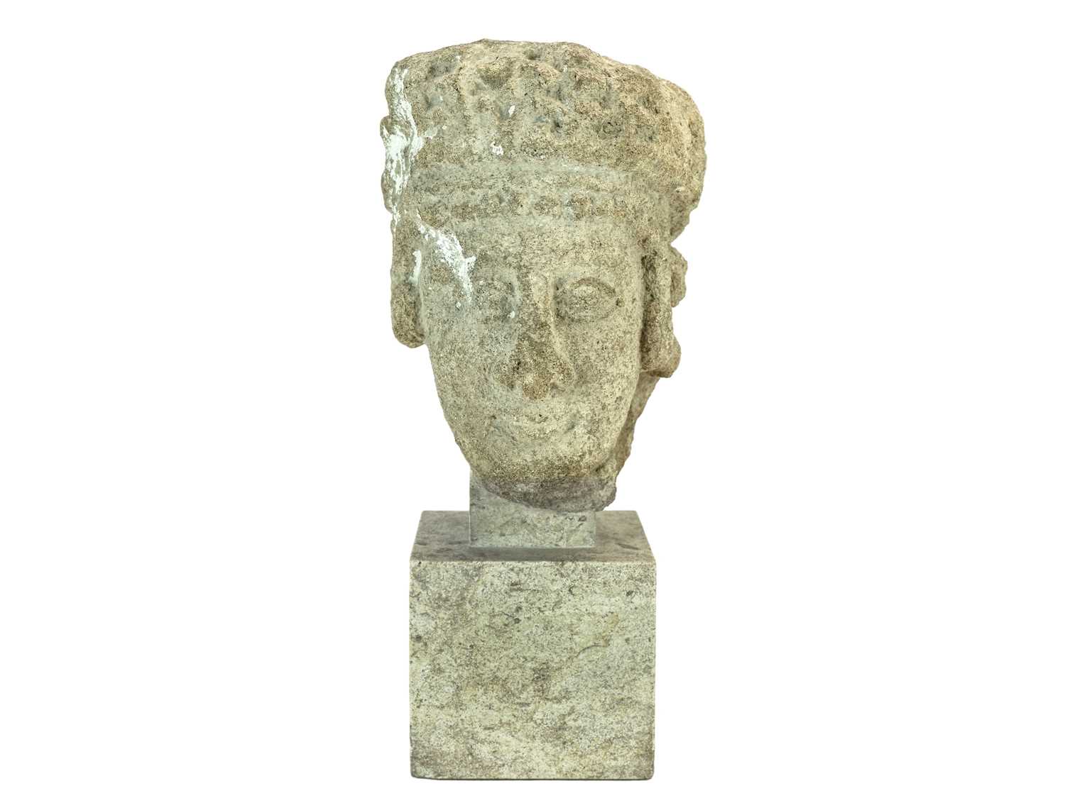 Lot 1115 - A Cypriot limestone head of a female Votary.