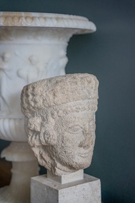 Lot 95 - A Cypriot limestone head of a female Votary.