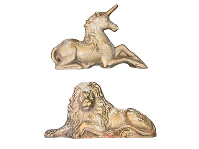 Lot 87 - A pair of reconstituted stone lion and unicorn figures.