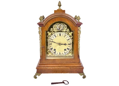 Lot 586 - A Winterhalder and Hofmeier German walnut cased mantel clock.