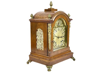 Lot 586 - A Winterhalder and Hofmeier German walnut cased mantel clock.