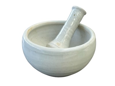 Lot 290 - A Leach Pottery porcelain celadon glazed pestle and mortar.