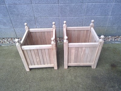 Lot 15 - Two Hardwood Planters. The Planters measure...