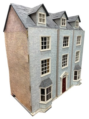 Lot 14 - A substantial furnished doll's House wired for...