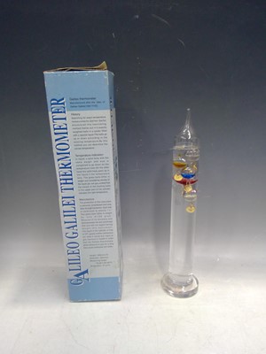 Lot 44 - A Galileo Thermometer. The Thermometer is 28cm...