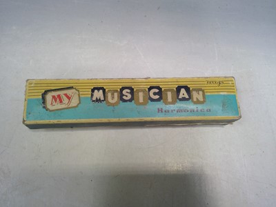 Lot 69 - A Vintage Harmonica.