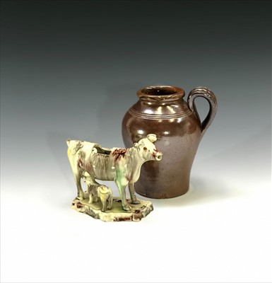 Lot 1013 - A creamware cow creamer, circa 1770, painted...