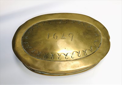 Lot 13 - A brass tobacco box of oval form, inscribed...
