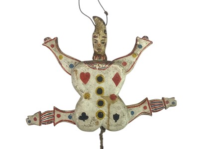 Lot 86 - A 19th century two sided Jumping Jack toy.