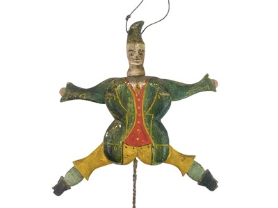 Lot 86 - A 19th century two sided Jumping Jack toy.