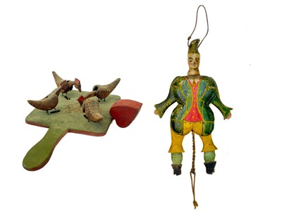 Lot 86 - A 19th century two sided Jumping Jack toy.