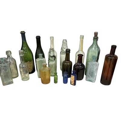 Lot 128 - A collection of vintage bottles, the largest...