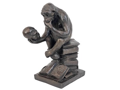 Lot 11 - A resin model of Darwin's ape.