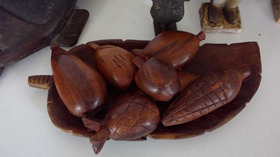 Lot 182 - Terracotta army figures, a wooden carved...