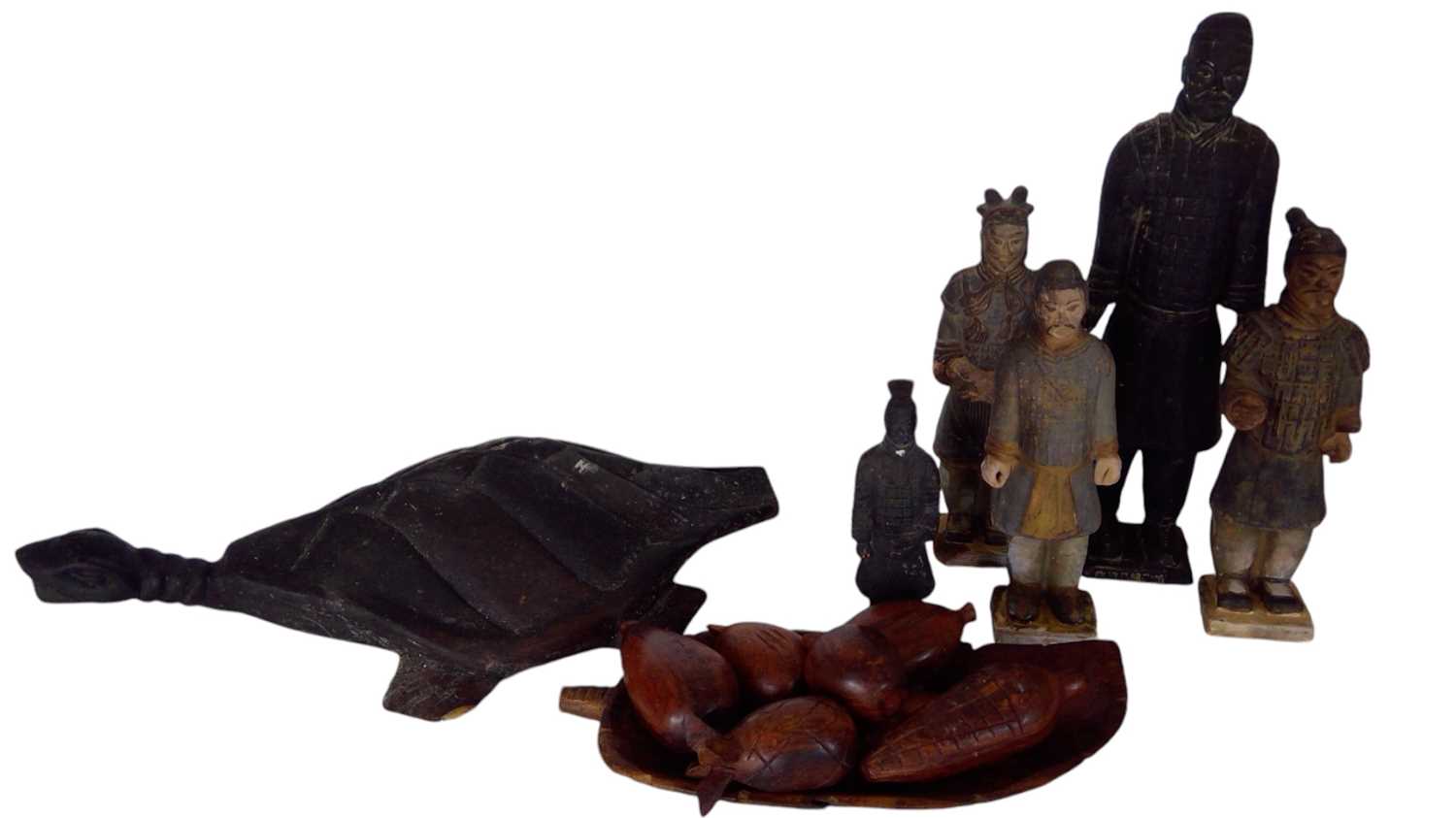Lot 182 - Terracotta army figures, a wooden carved...
