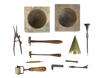 Lot 118 - A collection of silversmithing tools.