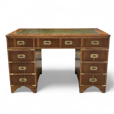 Lot 23 - A campaign-style modern desk with a yew wood...