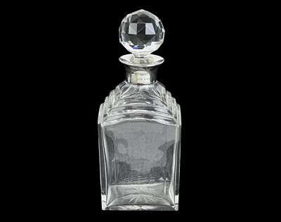 Lot 471 - An Art Deco cut glass and silver mounted decanter and stopper.