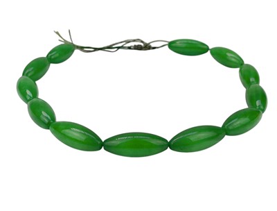 Lot 672 - A Chinese jadeite necklace.