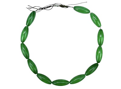 Lot 672 - A Chinese jadeite necklace.