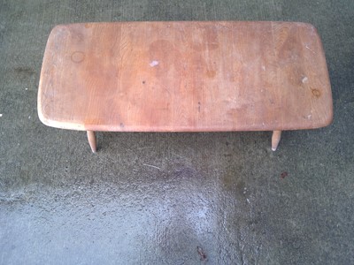 Lot 5 - An Ercol Coffee Table. With a Magazine Rack...