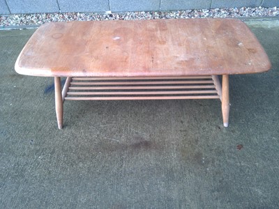 Lot 5 - An Ercol Coffee Table. With a Magazine Rack...