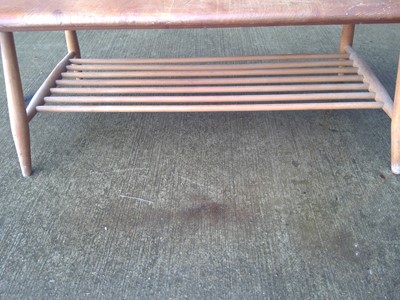 Lot 5 - An Ercol Coffee Table. With a Magazine Rack...