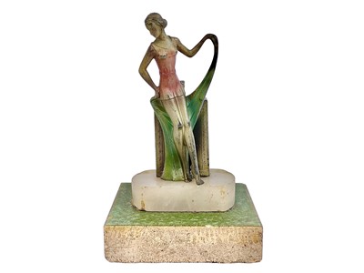 Lot 97 - An Art Deco spelter strike table lighter.