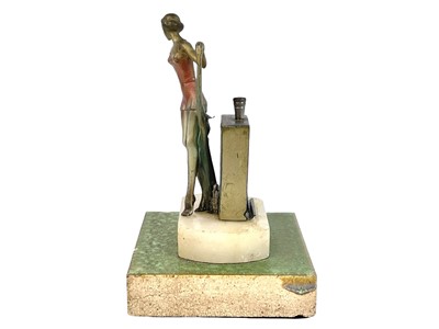 Lot 97 - An Art Deco spelter strike table lighter.