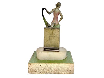 Lot 97 - An Art Deco spelter strike table lighter.