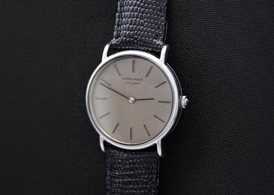 Lot 78 - LONGINES - A stainless steel gentleman's manual wind dress wristwatch.