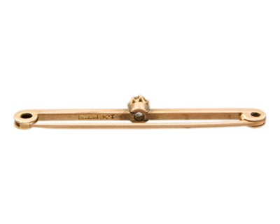 Lot 160 - A 9ct old mine-cut diamond set bar brooch.
