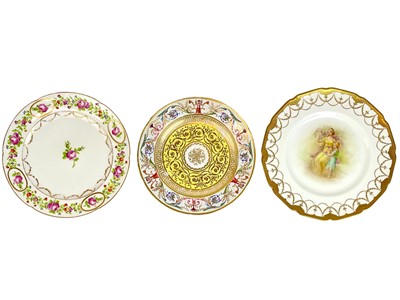 Lot 405 - Three porcelain cabinet plates.