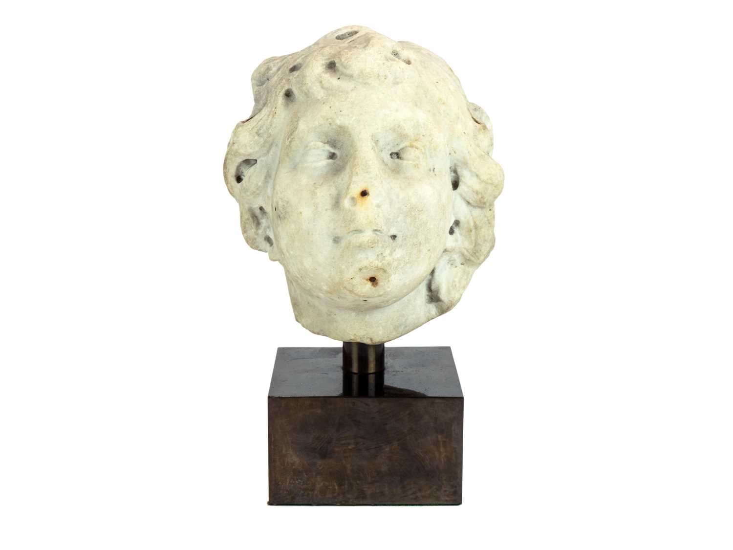 Lot 1114 - A Renaissance marble head of a cherubic youth.