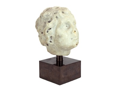 Lot 1114 - A Renaissance marble head of a cherubic youth.