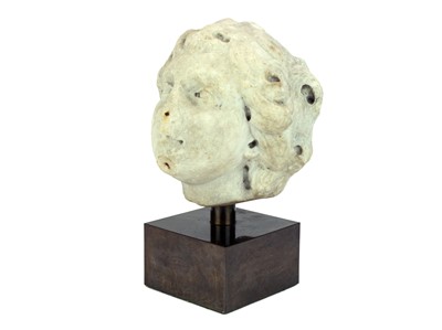 Lot 1114 - A Renaissance marble head of a cherubic youth.