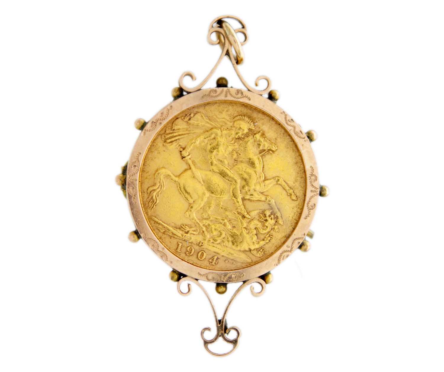 Lot 235 - A 9ct mounted sovereign coin pendant.