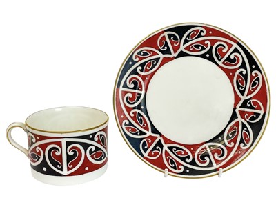 Lot 435 - A Royal Doulton Maori Art pattern teacup and saucer.