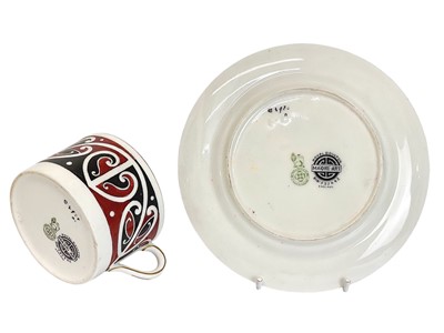 Lot 435 - A Royal Doulton Maori Art pattern teacup and saucer.