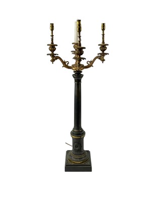 Lot 582 - A 19th century bronze and gilt metal five branch candelabra.