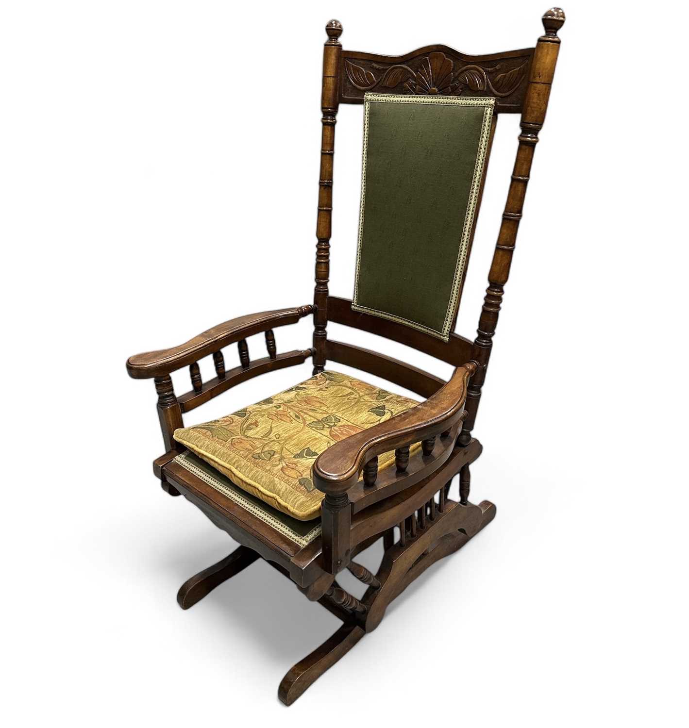 Lot 168 - A Victorian American rocking chair.