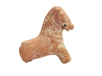 Lot 1055 - A Hellenistic terracotta fragmentary figure of a horse.